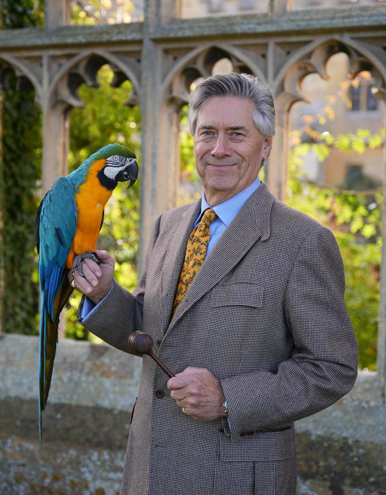 Nicholas Granger with Bella the macaw
